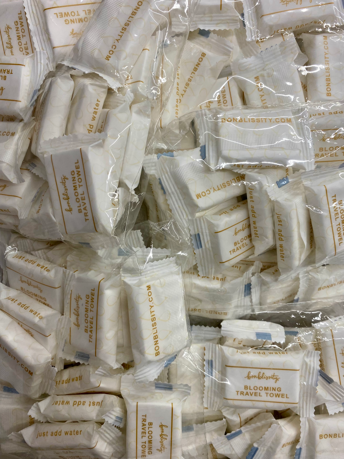 Bulk Blooming Travel Towel (100 towels) - MSRP $1.50-$2.00 per towel